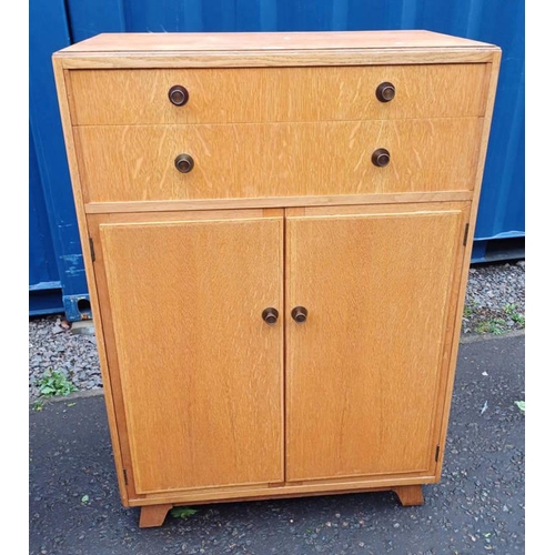 5436 - MID 20TH CENTURY OAK CABINET WITH 2 DRAWERS OVER 2 PANEL DOORS.  121 CM TALL X 84 CM WIDE