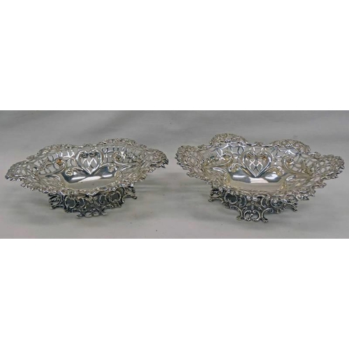 55 - PAIR SILVER PIERCE WORK DISHES ON DECORATIVE BASES BY WILLIAM COMYNS, LONDON 1890 RETAILED BY BROOK ... 