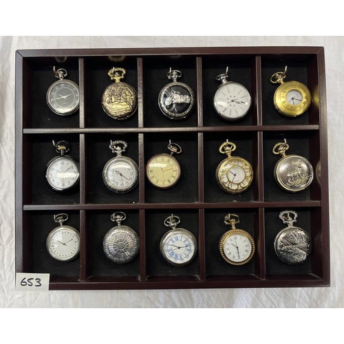 653 - 15 DECORATIVE POCKET WATCHES IN A DISPLAY STAND