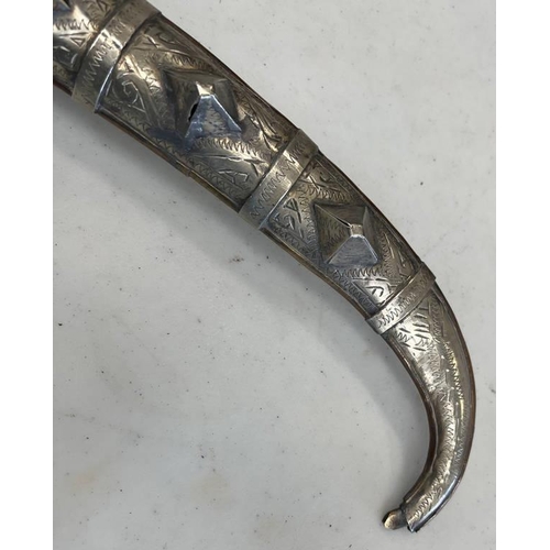 1224 - INDIAN KINJHAL WITH 19.5CM LONG CURVED BLADE, HEAVILY DECORATED WHITE METAL GRIP AND SCABBARD WITH R... 