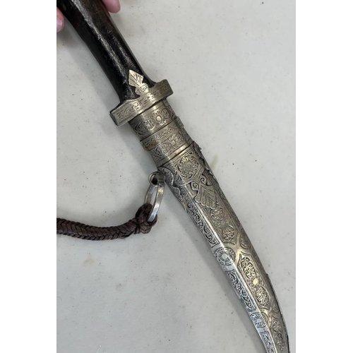 1289 - MOROCCAN JAMBIYA WITH CURVED DOUBLE-EDGE STEEL BLADE, NICKEL MOUNTS AND TOOLED NICKEL SCABBARD, 21.5... 