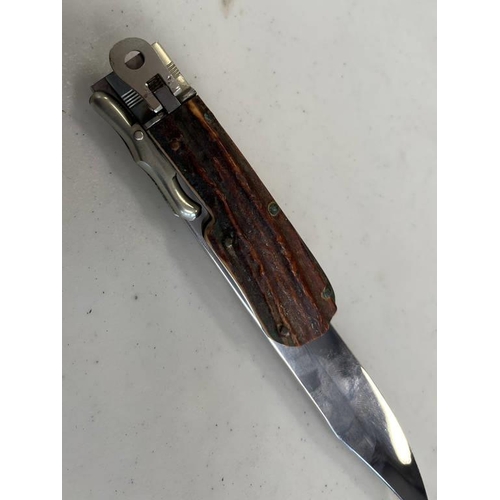 1293 - ANTON WINGEN JB SOLINGEN FOLDING BOWIE STYLE KNIFE WITH ITS 22CM LONG FOLDING BLADE WITH A LEATHER S... 