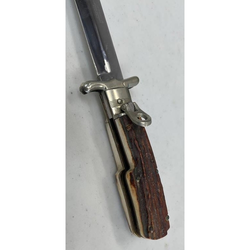 1293 - ANTON WINGEN JB SOLINGEN FOLDING BOWIE STYLE KNIFE WITH ITS 22CM LONG FOLDING BLADE WITH A LEATHER S... 