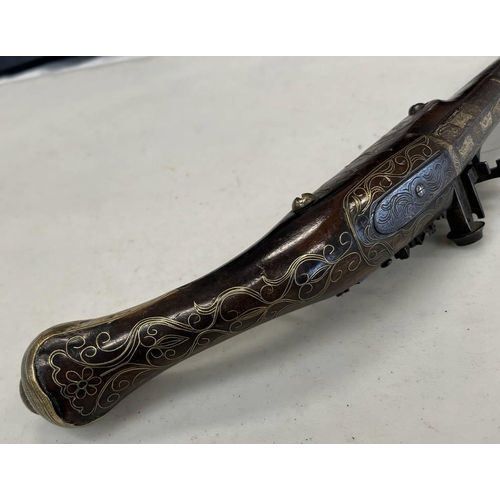 1483 - 18 BORE NORTH AFRICAN SNAPHAUNCE PISTOL WITH 30.8CM LONG TWO STAGE BARREL ENGRAVED INLAID BRASS AND ... 