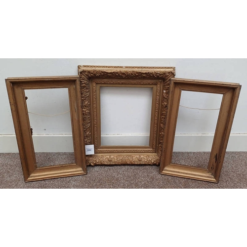 1055 - TWO MATCHING EDWARDIAN GILTWOOD FRAMES, 46.5CM X 21CM INNER SIZE AND ONE OTHER FRAME OF SIMILAR STYL... 