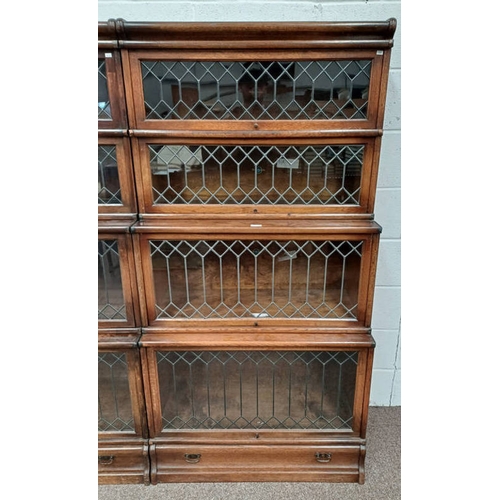 13B - GLOBE & WERNICKE OAK SECTIONAL BOOKCASE WITH 4 LEADED GLASS PANEL DOORS & SINGLE DRAWER TO BASE. LAB... 