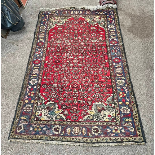 1433 - RED GROUND MIDDLE EASTERN RUG WITH ALL OVER DESIGN, 173 X 103 CM