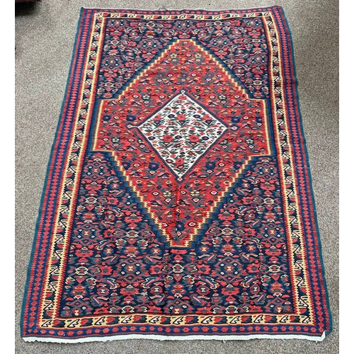 1477 - RED AND BLUE MIDDLE EASTERN RUG 153CM X 108CM