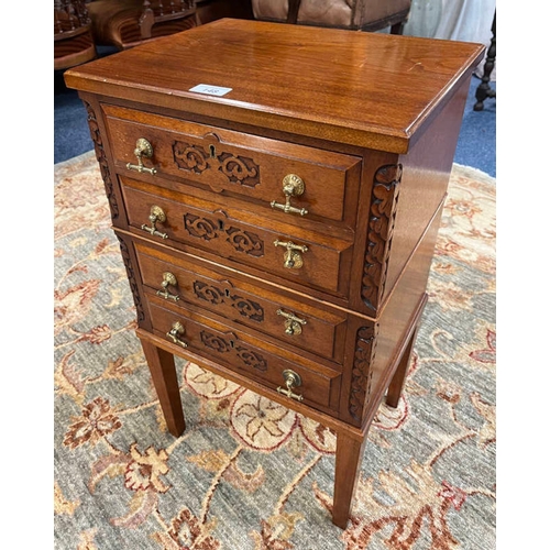 148 - SMALL MAHOGANY CHEST OF 4 DRAWERS WITH CARVED DECORATION ON SQUARE TAPERED SUPPORTS.  69 CM TALL X 3... 