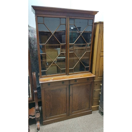 200 - 19TH CENTURY MAHOGANY BOOKCASE WITH 2 ASTRAGAL GLASS PANEL DOORS OVER BASE OF 2 DRAWERS OVER 2 PANEL... 