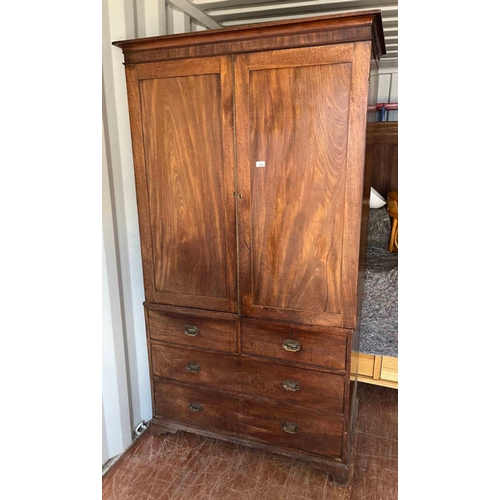 214 - 19TH CENTURY MAHOGANY LINEN PRESS WITH 2 PANEL DOORS OPENING TO SHELVED INTERIOR OVER BASE WITH 2 SH... 