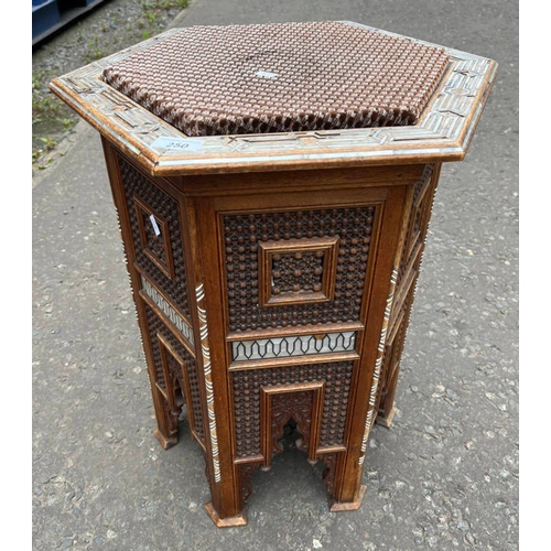 250 - 20TH CENTURY EASTERN HARDWOOD HEXAGONAL TABLE WITH DECORATIVE INLAY.  57 CM TALL X 46 CM WIDE