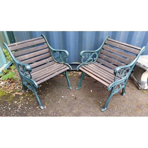 260 - PAIR OF GARDEN ARMCHAIRS WITH DECORATIVE CAST METAL ENDS