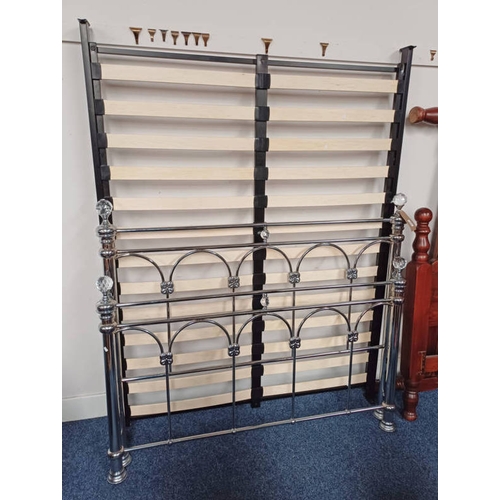 312 - METAL DOUBLE BED FRAME WITH CUT GLASS FINIALS.  TOTAL WIDTH 148 CM