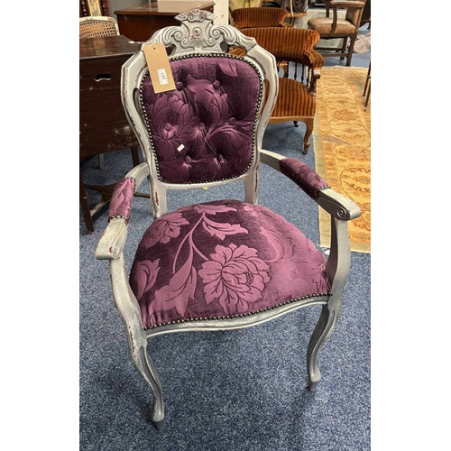 321 - CONTINENTAL BUTTONED BACK ARMCHAIR WITH SILVERED FRAME ON SHAPED SUPPORTS