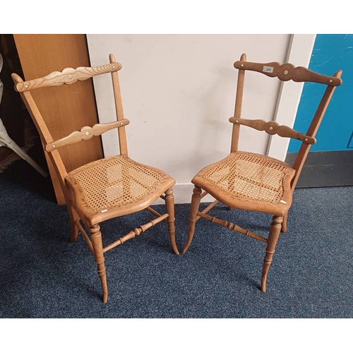 325 - PAIR OF LATE 19TH/ EARTH 20TH CENTURY ELM & BEECH HAND CHAIRS WITH BERGERE SEATS ON SPLAYED SUPPORTS... 