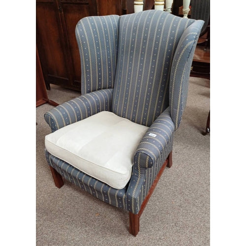 39 - 20TH CENTURY MAHOGANY WINGBACK ARMCHAIR ON SQUARE SUPPORTS - 110 CM TALL