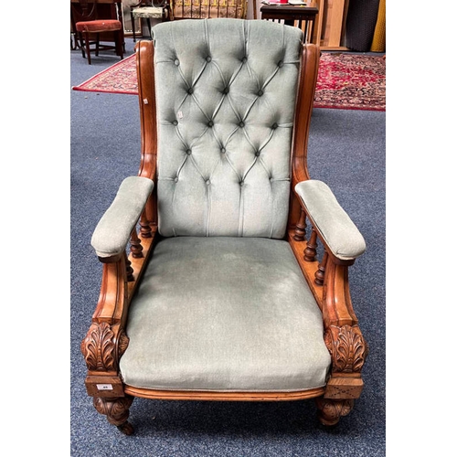 48 - 19TH CENTURY CARVED MAHOGANY BUTTON BACK GENTLEMAN'S ARMCHAIR ON DECORATIVE REEDED SUPPORTS.