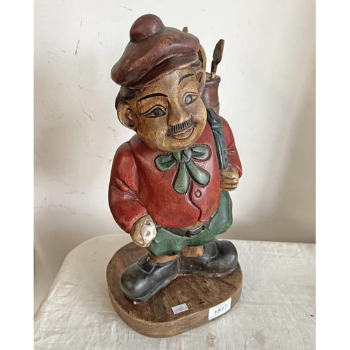 1517 - CARVED WOODEN FIGURE OF A GOLFER 39CM TALL