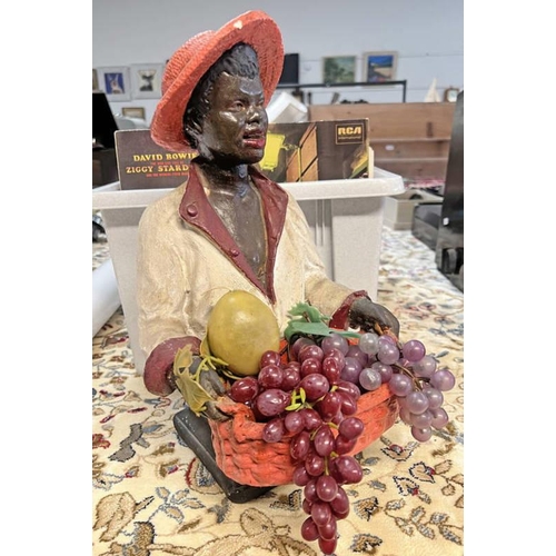 1518 - FRUIT SELLER FIGURE WITH FAUX FRUIT IN A BASKET, 40CM TALL