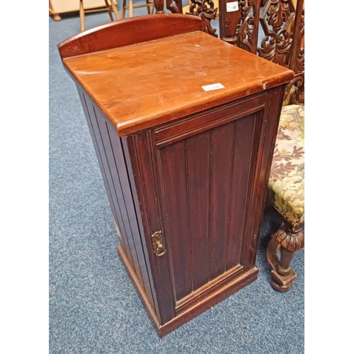 84 - MAHOGANY CABINET WITH PANEL DOOR OPENING TO SHELVED INTERIOR ON PLINTH BASE, WIDTH 38CM