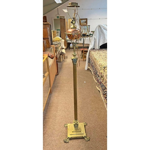 1092 - EARLY 20TH CENTURY BRASS EXTENDING FLOOR LAMP CONVERTED TO ELECTRICITY WITH COPPER RESERVOIR TO TOP,... 