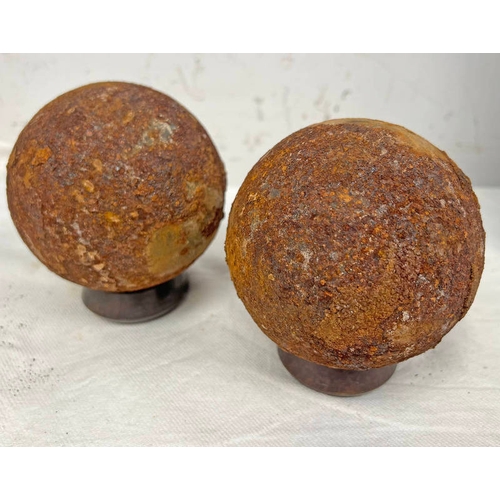 1107 - PAIR OF 9 LB NAVAL CANNON BALLS WITH STANDS, EACH CANNON BALL IS 9CM ACROSS AND WEIGHS 4.1KG