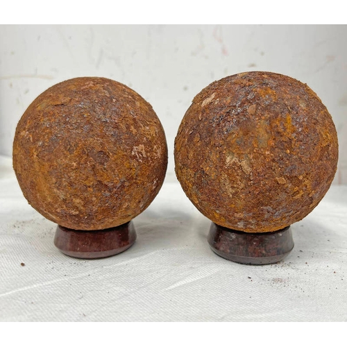 1110 - PAIR OF 9 LB NAVAL CANNON BALLS WITH STANDS, EACH CANNON BALL IS 9CM ACROSS AND WEIGHS 4.1KG