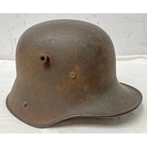 1127 - WW1 PERIOD GERMAN M16 STEEL HELMET STAMPED TJ66 TO BODY WITH A LEATHER LINER TO INTERIOR