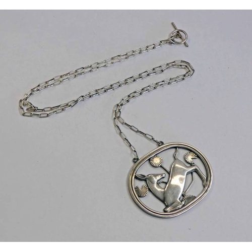 210 - GEORG JENSEN DANISH SILVER PENDANT ON CHAIN, NO 95 DEPICTING A KNEELING DEER - 4.2 CM WIDE