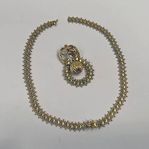 215 - 18CT GOLD DECORATIVE CHAIN NECKLACE & PENDANT MARKED 750 - 34.0 G , AS FOUND