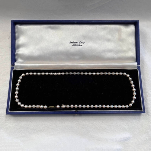 233 - SINGLE STRAND CULTURED PEARL NECKLACE WITH SEED PEARL SPACERS ON A 9CT GOLD CLASP - 49.5 CM LONG