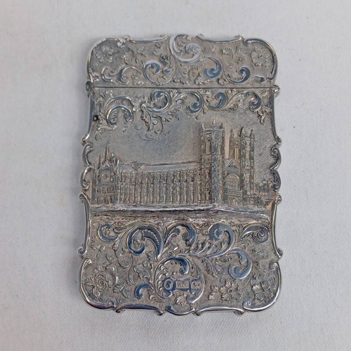 261 - VICTORIAN SILVER CASTLE TOP CARD CASE WITH A DEEP RELIEF DEPICTION OF WESTMINSTER ABBEY WITHIN A SUR... 