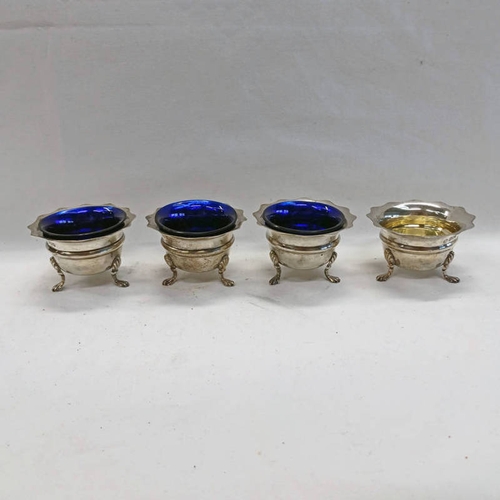 287 - SET OF 4 SILVER SALTS ON 3 PAW FEET WITH BLUE GLASS LINERS - 1 MISSING, SHEFFIELD 1899 - 125G