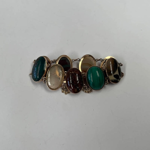 318 - GOLD AGATE & HARDSTONE PANELLED BRACELET, UNMARKED - 17CM APPROX