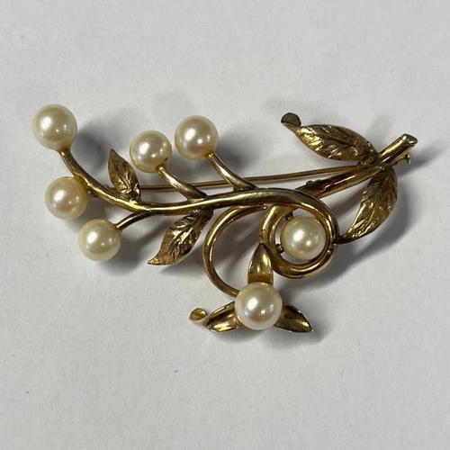 33 - 14K GOLD PEARL SET FLORAL SPRAY BROOCH - 5.5CM LONG, 7.7G