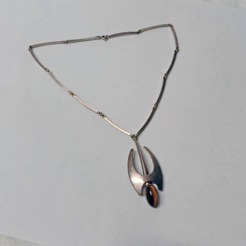 37 - DANISH SILVER ABSTRACT PENDANT NECKLACE SET WITH TIGERS EYE BY NIELS ERIK FROM, IMPORT MARKS FOR 197... 