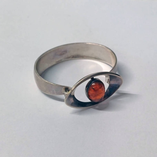 46 - DANISH SILVER MODERNIST BANGLE WITH AMBER SET TO CLASP BY NIELS ERIK FROM - INNER CIRCUMFERENCE 17.5... 