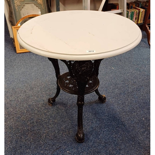 5018 - CIRCULAR PUB TABLE WITH PAINTED TOP ON DECORATIVE CAST METAL SUPPORTS WITH MASK DECORATION.  DIAMETE... 