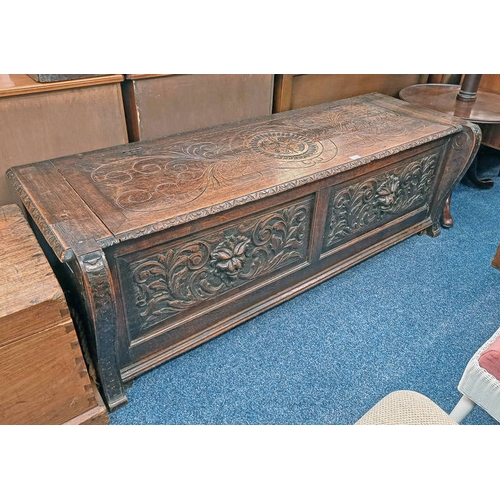 5123 - 19TH CENTURY CARVED OAK COFFER WITH LION MASK CARVED PANEL FRONT, 53CM TALL X 162CM LONG