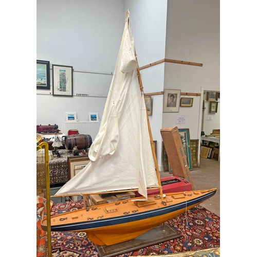 5465 - MODEL POND YACHT WITH SAIL ON STAND, 121CM LONG