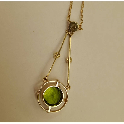 111 - EARLY 20TH CENTURY 15CT GOLD PEARL & PERIDOT NEGLIGEE PENDANT. THE CIRCULAR PERIDOT SET BETWEEN 4 SE... 