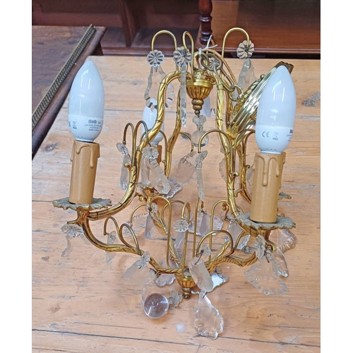 1469 - GILTED METAL 4 BRANCH CHANDELIER WITH GLASS DROPLETS