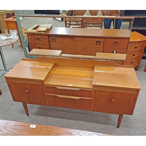 241 - TEAK DRESSING TABLE WITH MIRROR OVER 2 CENTRALLY SET DRAWERS FLANKED BY 2 PANEL DOORS ON TAPERED SUP... 