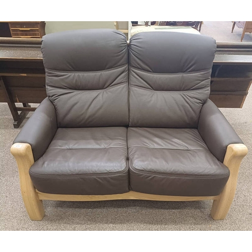 253 - OAK FRAMED BROWN LEATHER 2 SEATER SETTEE