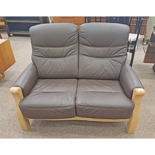 254 - OAK FRAMED BROWN LEATHER 2 SEATER SETTEE