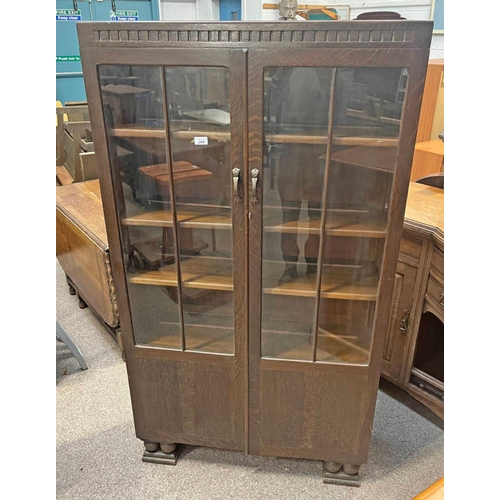 289 - MID 20TH CENTURY OAK BOOKCASE WITH 2 GLAZED PANEL DOORS.  165 CM TALL