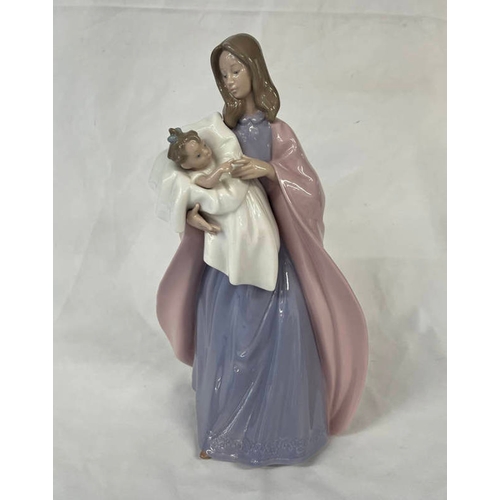 3054 - NAO PORCELAIN FIGURE ' A MOTHERS TOUCH'. HEIGHT - 33 CM