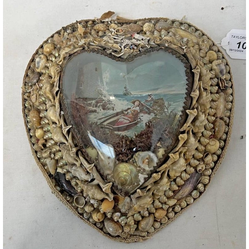 1011 - EARLY 20TH CENTURY SEA SHELL HEART SHAPED WALL PLAQUE WITH LIGHT HOUSE SCENE, 21CM ACROSS