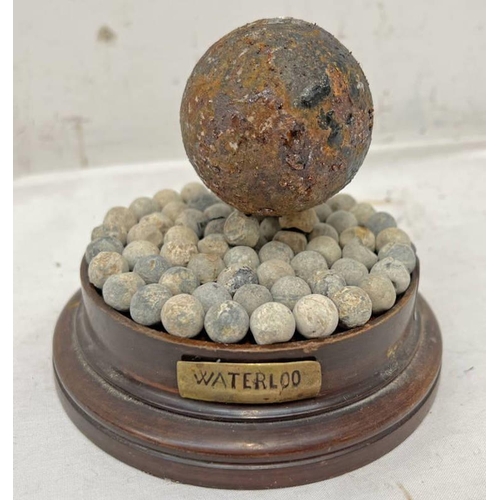 1012 - BATTLE OF WATERLOO - CANNON BALL MOUNTED ON LEAD MUSKET BALLS / GRAPE SHOT ON A WOODEN BASE WITH BRA... 